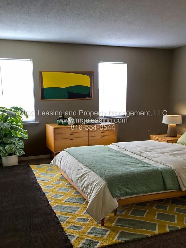 Building Photo - Lee's Summit Townhome w/ Unfinished Baseme...