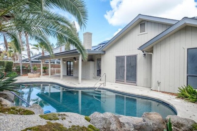 Building Photo - Drench Yourself in Luxury: 3-Bedroom Corner Oasis with a Sparkling Pool!
