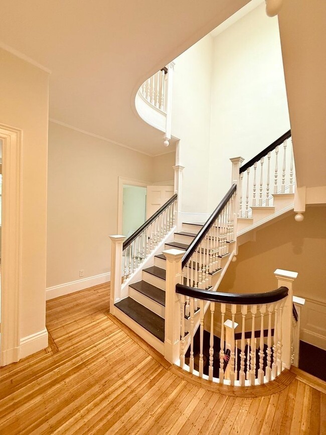 Building Photo - Brookline Row House with Covered Parking