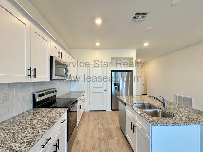 Foto del edificio - 18100 W Soft Wind Dr