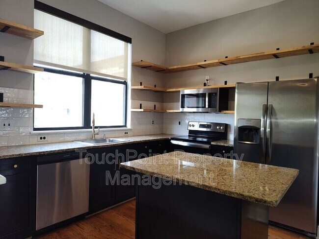 Foto del edificio - 926 E 8th St
