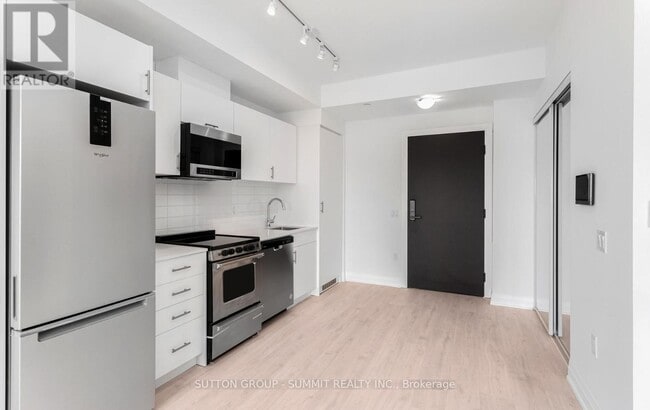 Photo du bâtiment - 412-412 Silver Maple Rd