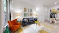 Located in Huntersville, NC, this well-designed 2-bedroom, 2-bathroom residence offers a thoughtful single-level layout filled with natural light and modern finishes throughout. The open-concept kitchen is a standout feature, boasting crisp white shaker cabinetry, gleaming quartz countertops, stainless steel appliances, and a generously sized island with bar seating — ideal for casual dining and entertaining. Light wood-style flooring flows through the kitchen and living areas, complementing the bright, airy atmosphere created by high ceilings and recessed lighting. The living room is welcoming and well-proportioned, accented by crown molding and a glass door that opens to a private balcony with outdoor views. The primary bedroom offers a comfortable retreat with ample space and two closets for storage. The second bedroom, flooded with natural light from large windows, is versatile enough to serve as a home office or guest room. Both bathrooms are finished with white vanity cabinetry and light wood flooring, maintaining the clean, cohesive aesthetic found throughout the home. Two dedicated closets provide practical storage solutions. The overall ambiance is modern, bright, and inviting — a well-appointed home in a desirable North Charlotte community.