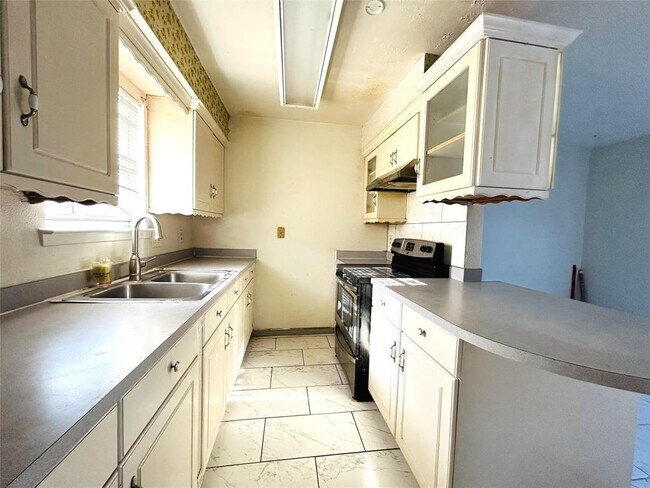 Foto del edificio - 6508 S Briar Bayou Dr