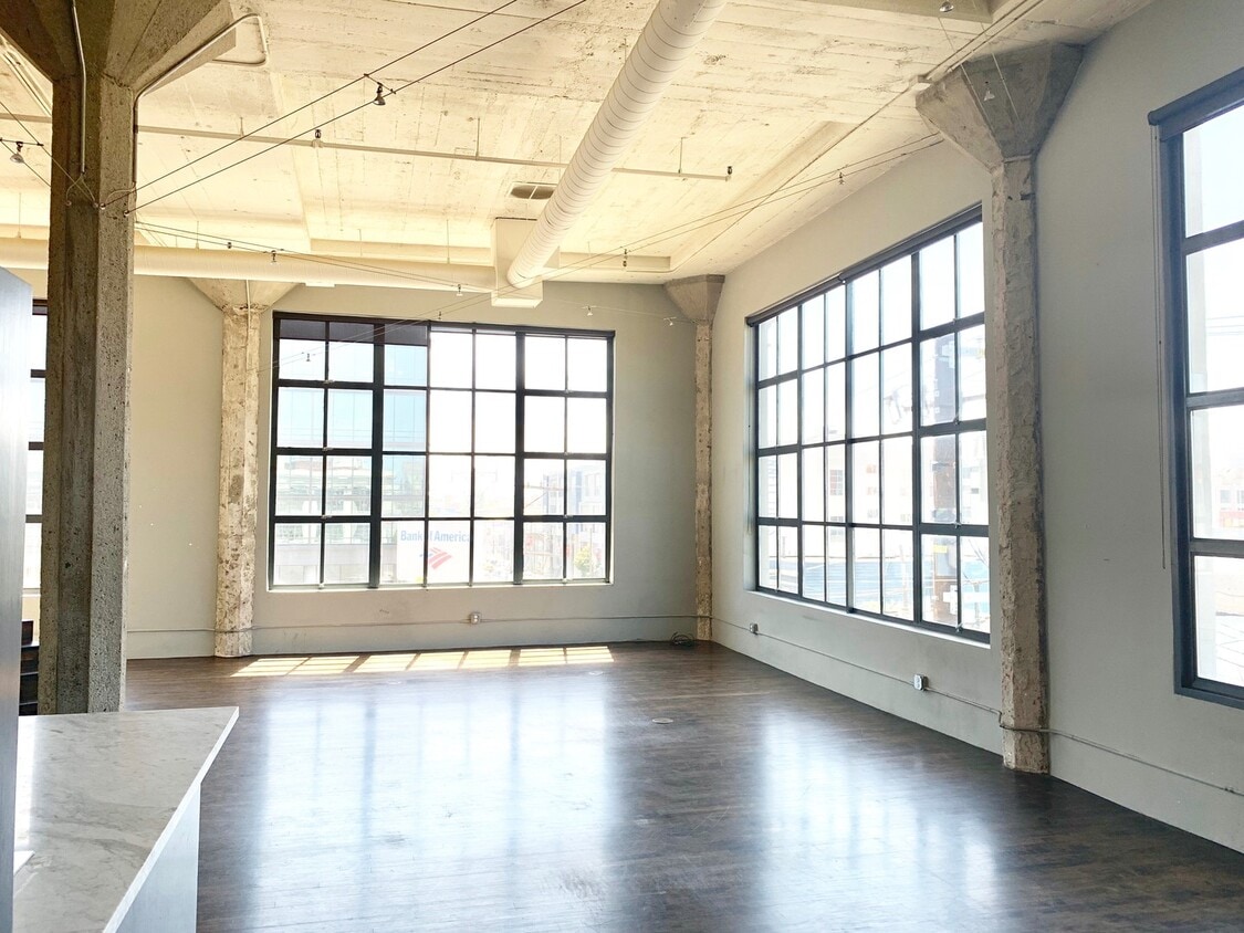 Primary Photo - STUNNING LARGE CORNER LIVE/WORK 1 BED+ DEN...