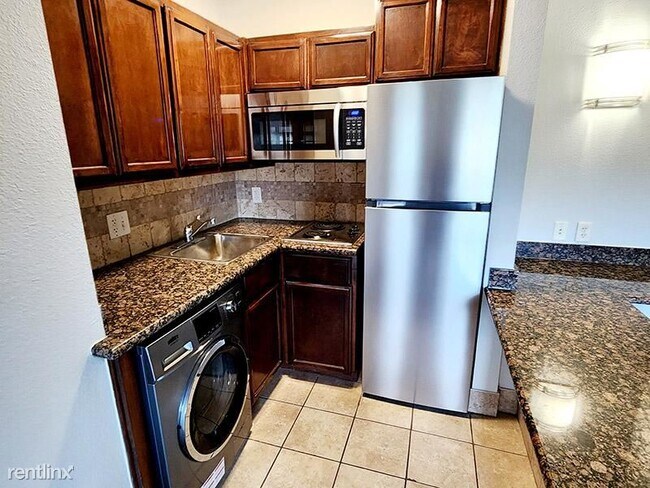 Foto del edificio - 1 br, 1 bath Condo - 27710 E University Dr...