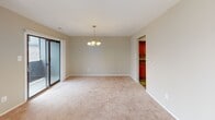 Located at 98 Oak St in Lindenwold, NJ, this two-story home offers a practical and comfortable layout across both levels. The main floor features a living area highlighted by a classic fireplace, providing a focal point for the space. Tile flooring in the entryway transitions to carpet in the living areas, while a carpeted staircase leads to the upper level. The dining area is accented by a chandelier and sliding glass doors that allow natural light to flow in. Adjacent to the dining space, the kitchen is equipped with warm oak cabinetry, laminate countertops, a stainless steel sink, and a gas range, offering ample storage and workspace. The upper floor hosts multiple carpeted bedrooms, each featuring windows that bring in natural light. One bathroom includes a full tub-shower combination with tile flooring and grab bar accessibility features. A second bathroom offers a vanity with a white cabinet base, a lighted mirror, tile flooring, and a glass-door shower. Throughout the home, textured ceilings and neutral wall tones create a cohesive and understated aesthetic, making this Lindenwold property a well-structured and functional residence.