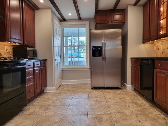 Window facing Erie St - 731 N Stokes St