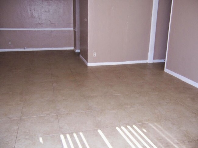 TILE THROUGHOUT - 2138 E Turney Ave