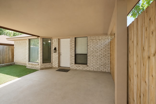 Building Photo - Darling Fort Worth Duplex! Vaulted Ceilings, Wood Beams & Covered Outdoor Living!