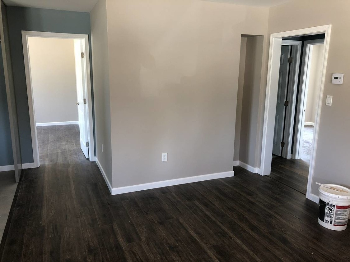living room view into master bedroom/ hallway - 2620 Chandler Blvd