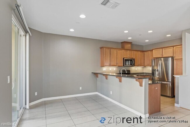 Building Photo - 2 br, 2.5 bath Condo - 2004 Anemone Way, S...