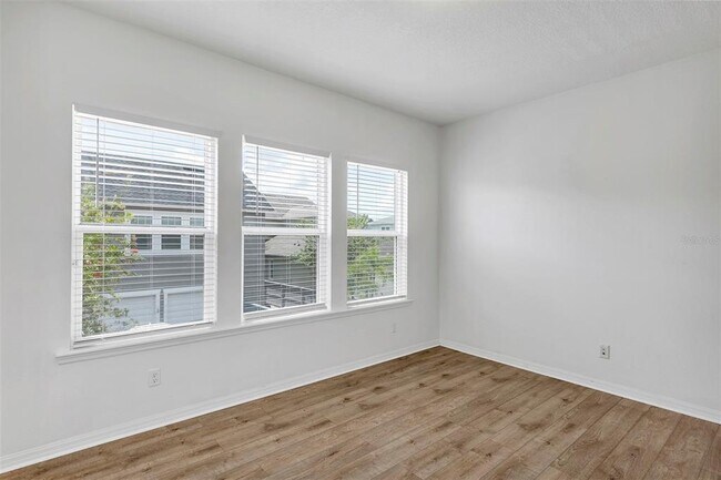 Building Photo - 8558 Tavistock Lakes Blvd