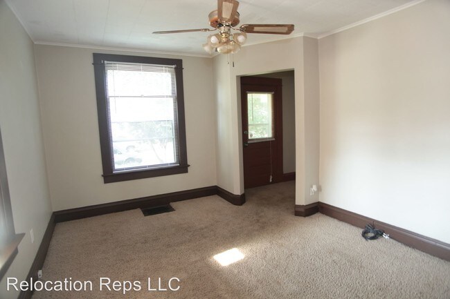Building Photo - 3 br, 1.5 bath House - 240 W. 31st St.
