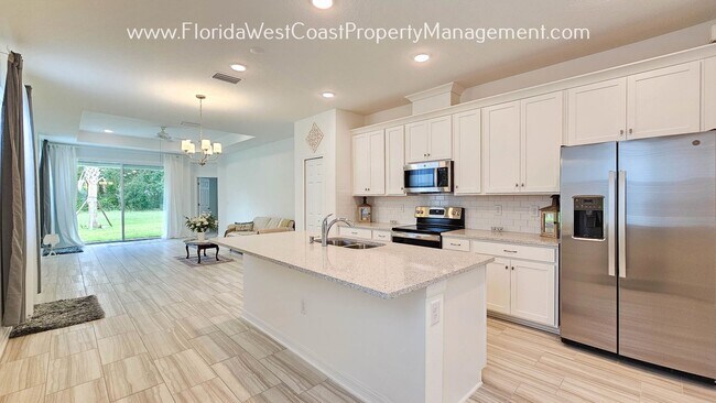Foto del edificio - OUTSTANDING SUMMERWOODS -PARRISH 3 BEDROOM...