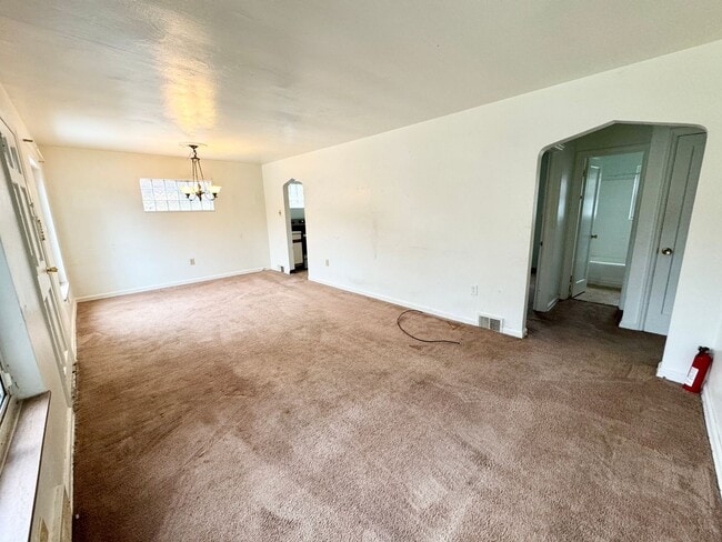 Building Photo - Beautiful Three Bedroom with Basement and Garage