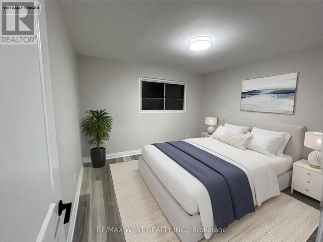 Photo du bâtiment - 322 Hansen Rd N