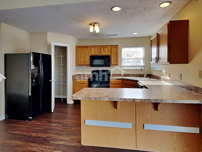 Foto del edificio - 5838 Twin River Ln