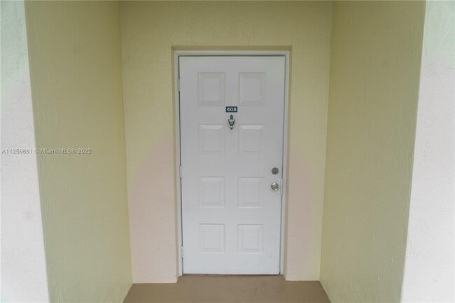Building Photo - 10710 NW 66th St  408 Doral Fl 33178