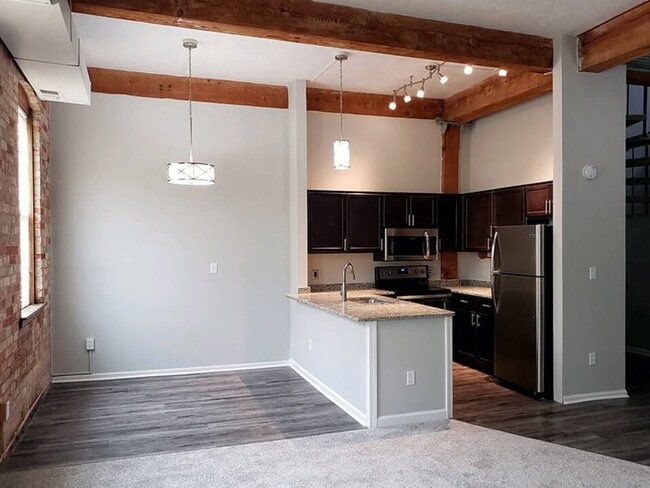 Original Wood Beams Across the Ceiling - Grand Ledge Apartments