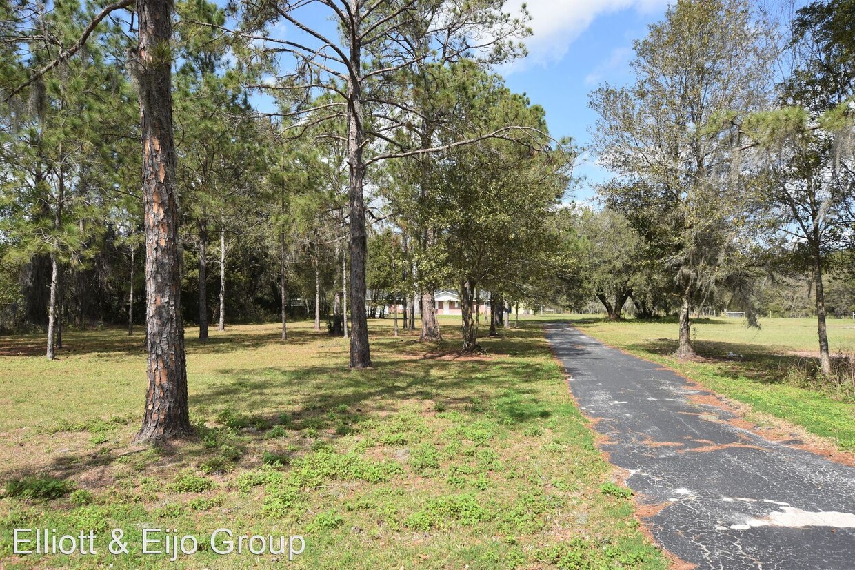 Foto principal - 3 br, 2 bath House - 2210 Old Polk City Rd