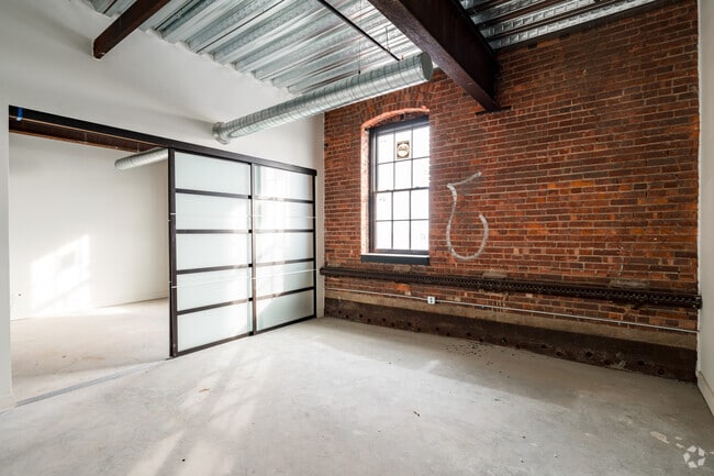 2BR, 1BA - 770SF - Primary Bedroom - The John Kam Malt House