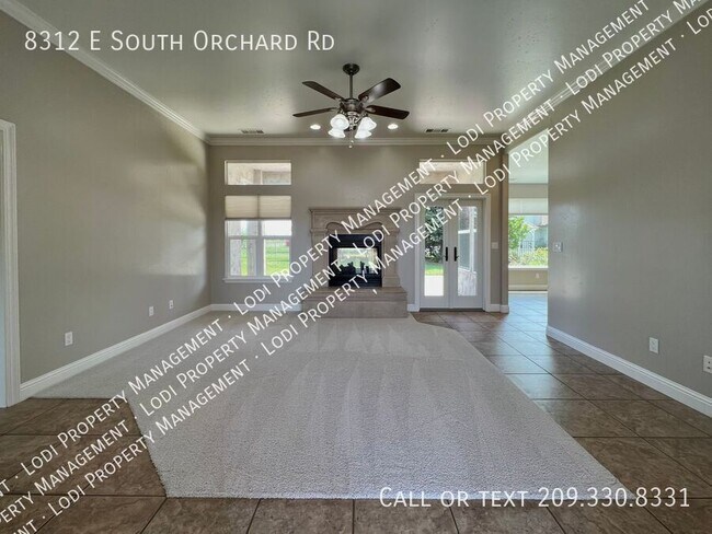Building Photo - 8312 E Orchard Rd
