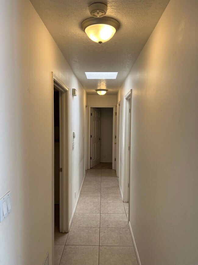 Building Photo - ACADEMY RIDGE 3 Bedroom 2 Bath with 2 car ...