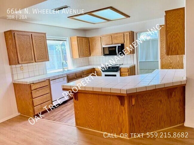 Foto del edificio - 6644 N Wheeler Ave