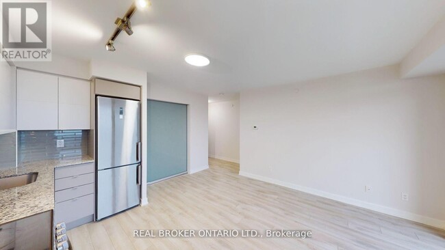 Building Photo - 120-1120 Varna Dr