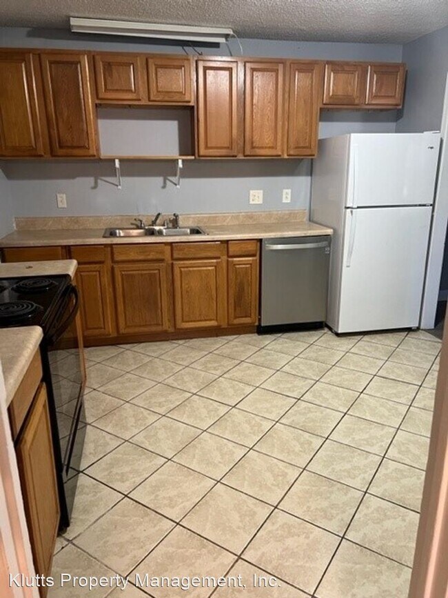 Building Photo - 4 br, 1.5 bath House - 9408 Windsong Drive