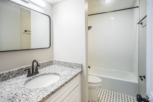 2BR, 1BA - 760SF - Bathroom - Den Apartments