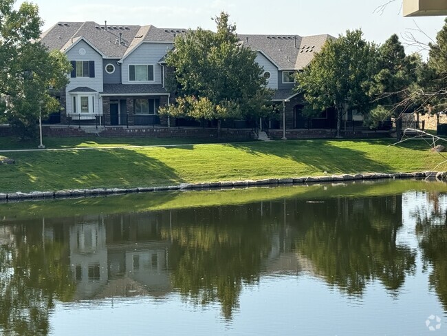 Townhome from across the pond- on left with bay window - 8935 E Phillips Dr