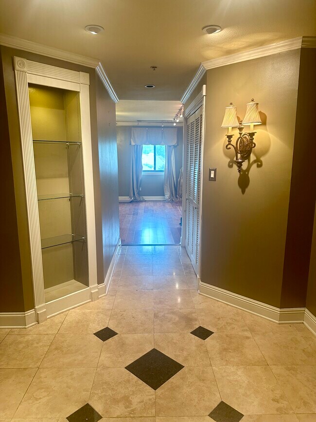 Entry foyer in unit - currently being painted soft white - 11550 Southfork Ave