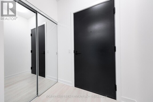 Photo du bâtiment - 117-1117 Broadway Ave