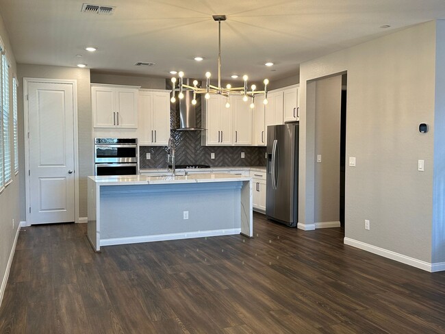 Building Photo - Spectacular Townhome in the newest Summerl...