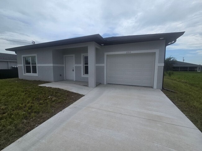 Building Photo - BRAND NEW 2/2/1 -  SW LEHIGH ACRES