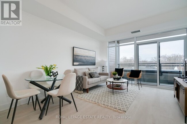 Building Photo - 1285 Queen St E