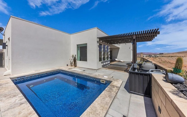 Building Photo - Stunning and Spacious 3 Bedroom Home in Desert Color! Includes a Private Pool!