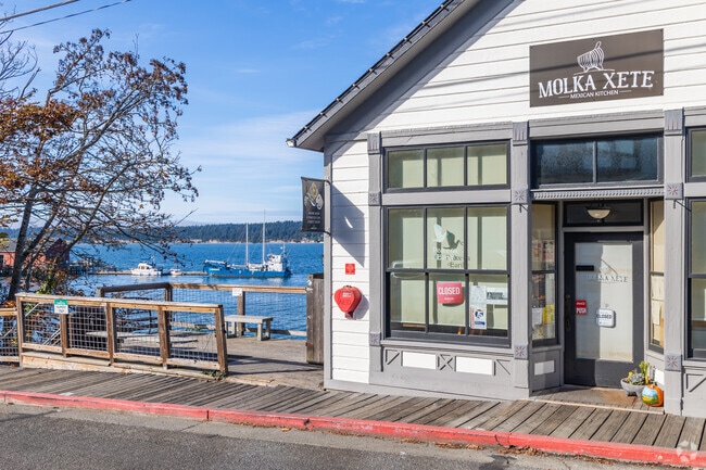 Small businesses dot the harbor and provide scenic views.