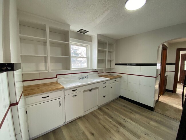 Building Photo - Rare 5-Bedroom Find!! Main-Floor Bed/Bath + Finished Attic Suite