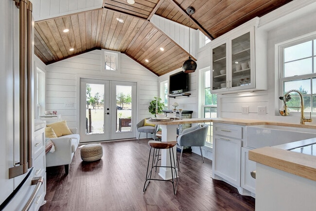 Shiplap interior with soaring wood ceiling and french doors open to front deck - 2510 Private Road 1180