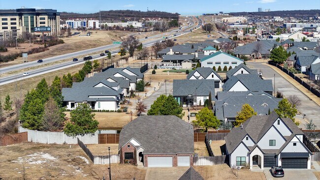 Building Photo - Stunner! This beautiful home features a spacious open floor plan with primary suite and private o...