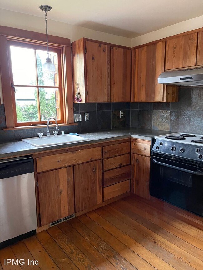 Foto del edificio - 3 br, 2 bath House - 1677 E. 25th Ave.