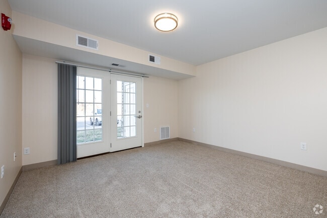1BR, 1BA - 638SF - Living Room - Emerald Reserve Blue Springs