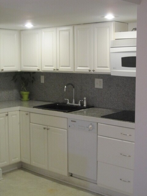Large kitchen (photo 1) - 5044 Klingle St NW