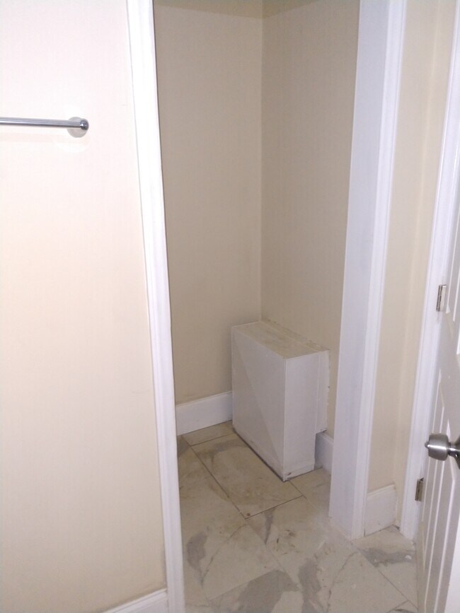 Linen closet in bath - 609 W Garrison Blvd