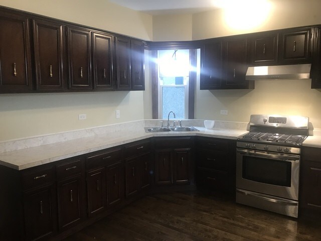 Foto del edificio - 1041 N Lawler Ave