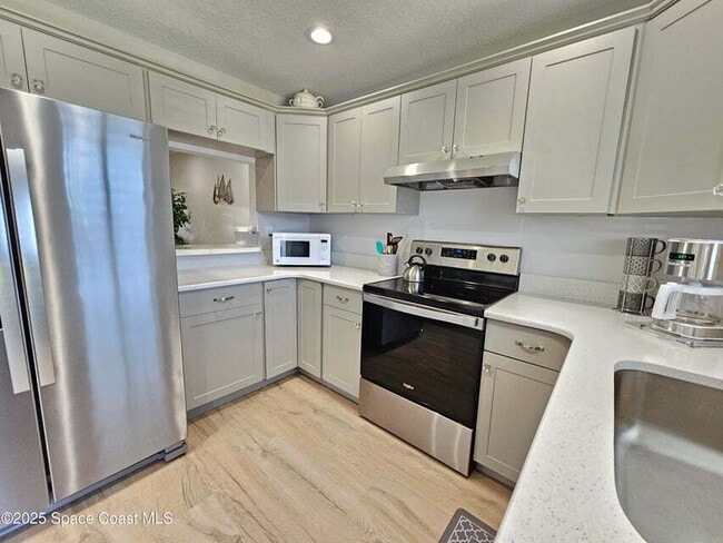 Building Photo - Furnished Cocoa Beach Condo
