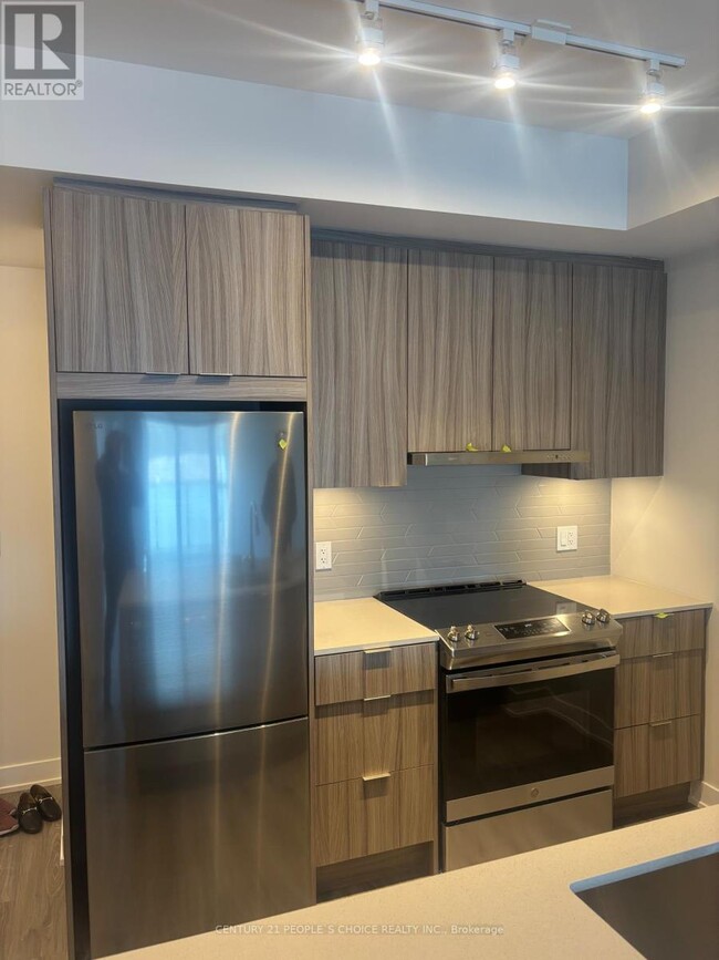Photo du bâtiment - 430-3430 Square One Dr